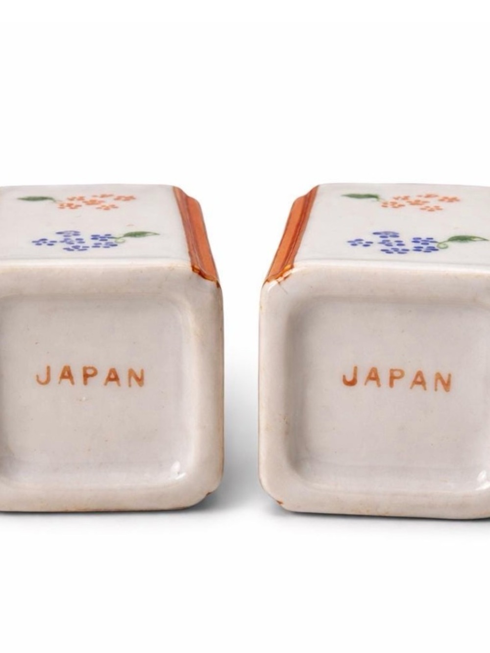Pair of White Ceramic Decorative Salt and Pepper Shakers with Red Trim - Picture 2 of 3